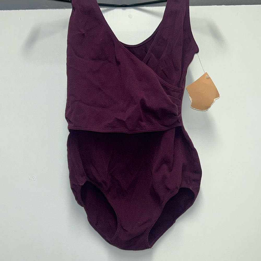 NWT BURGUNDY VINTAGE PREMIERE body suit medium